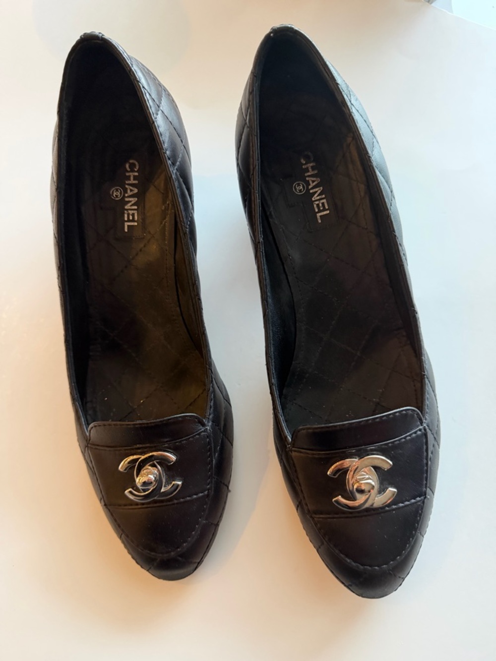 CHANEL Black Quilted Leather Flats with Silver CC